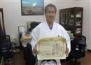 លោក វ៉ាត់ ចំរើន ទទួល​បាន​ខ្សែ​ក្រវាត់​ខ្មៅ​ការាតេ ៧​ដាន់ ពី​អង្គ​ការ​អន្តរ​ជាតិ